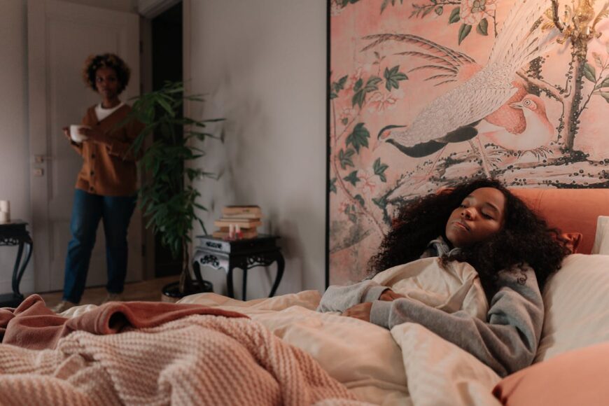 mother-brings-tea-to-her-child-in-bed-sick